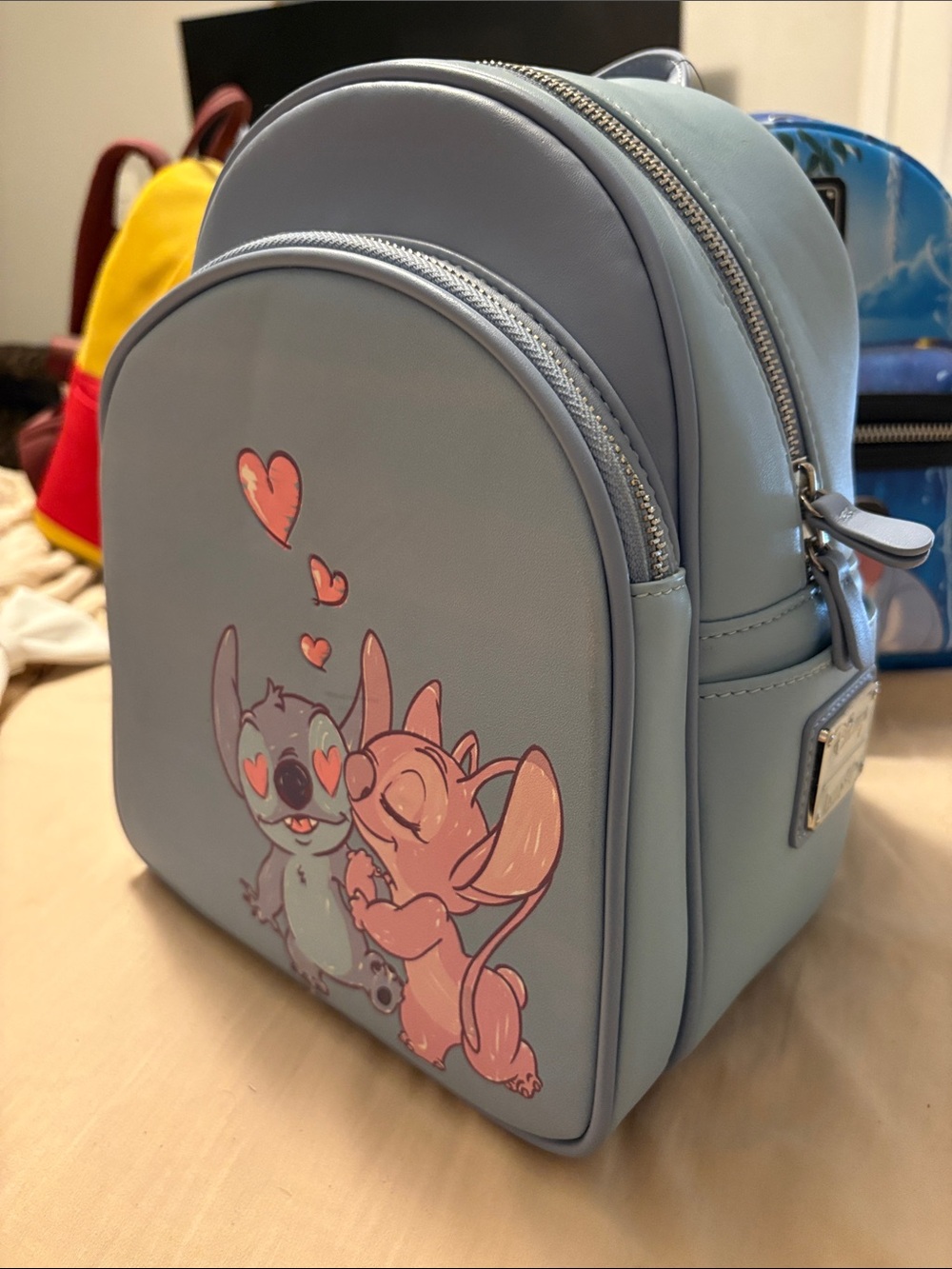 LOUNGEFLY Light Blue Mini Backpack with Cartoon Stitch & Angel Print
